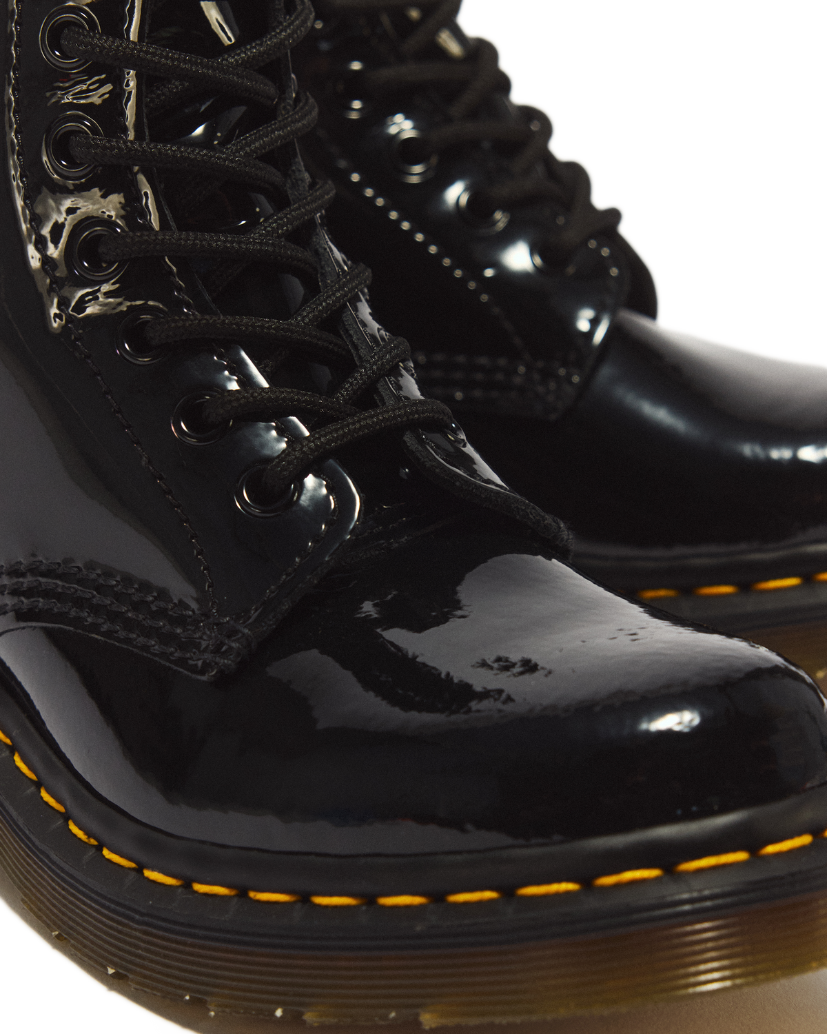 1460 Women's Patent Leather Lace Up Boots in Black