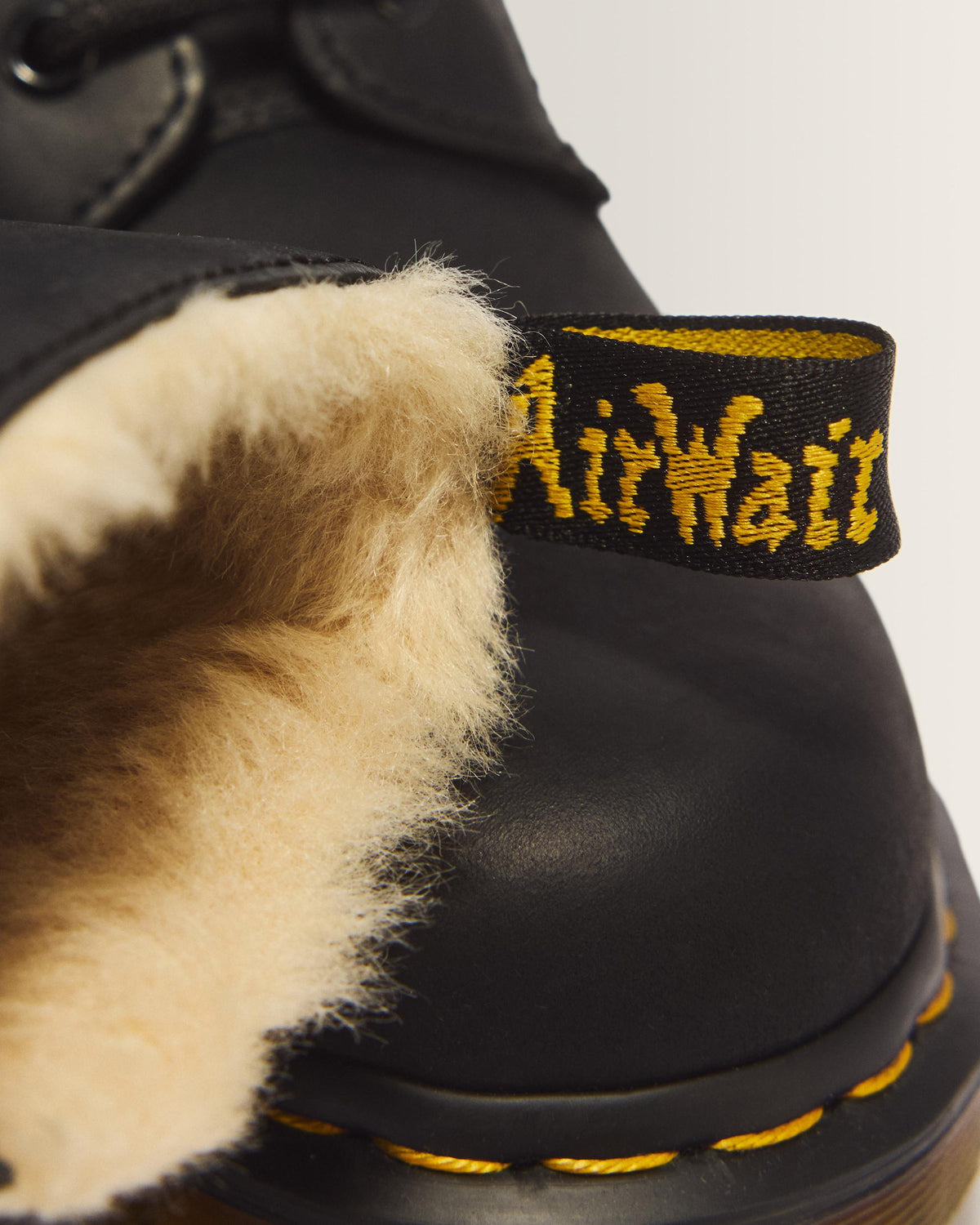 1460 Women's Faux Fur Lined Lace Up Boots in Black