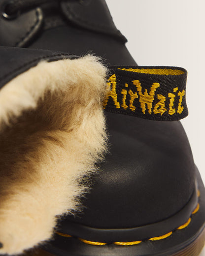 1460 Women's Faux Fur Lined Lace Up Boots in Black