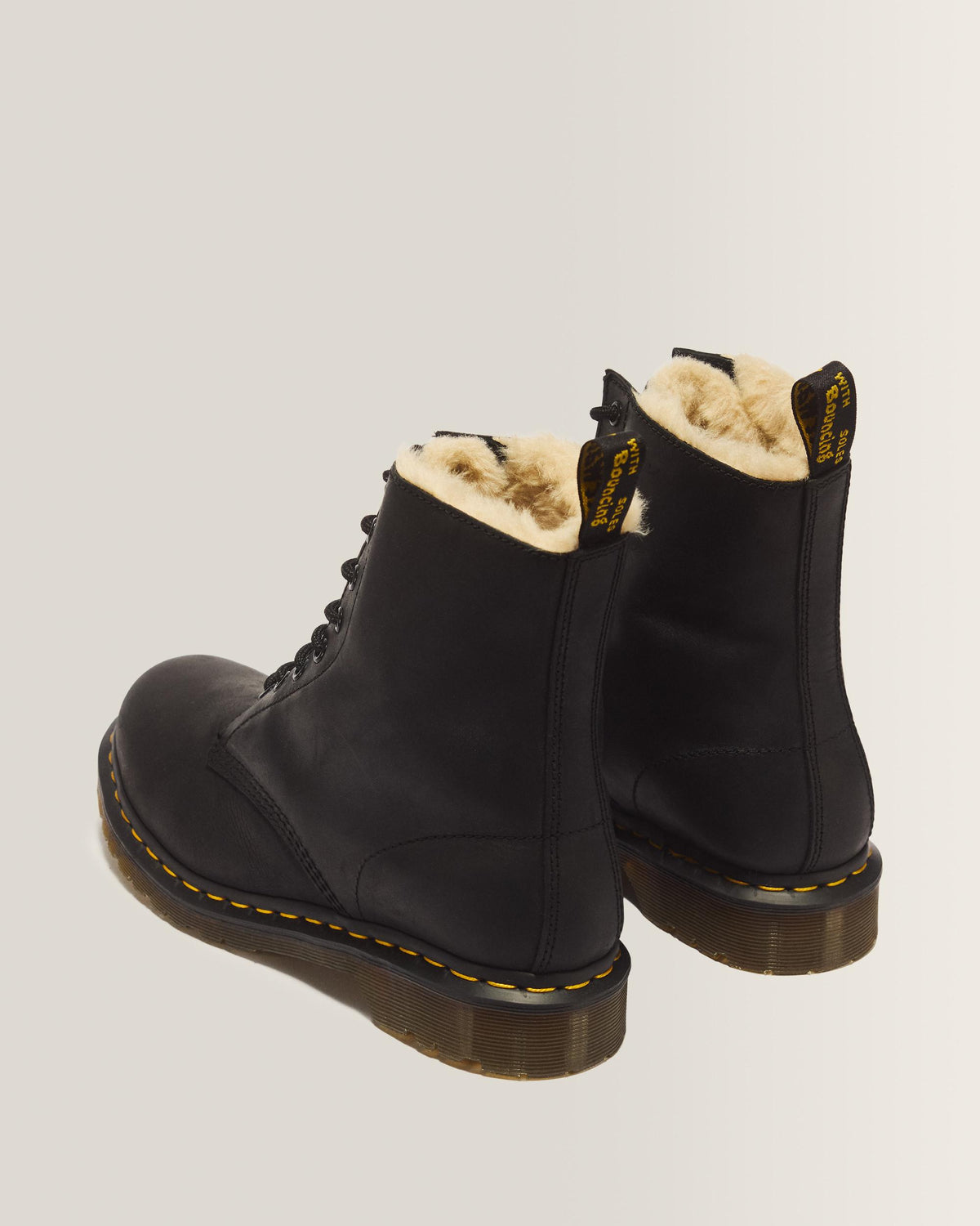 1460 Women's Faux Fur Lined Lace Up Boots in Black